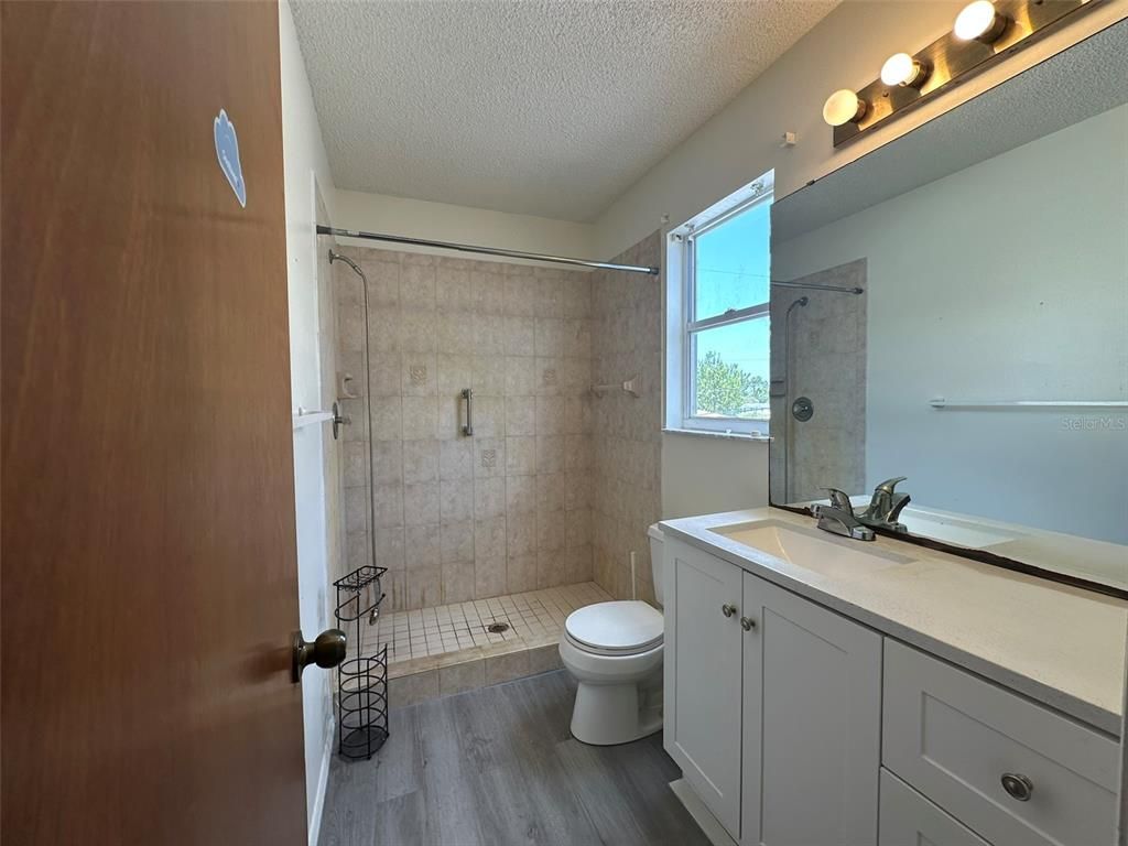 Bathroom, Glass Shower, Interior, Wood Texture Flooring