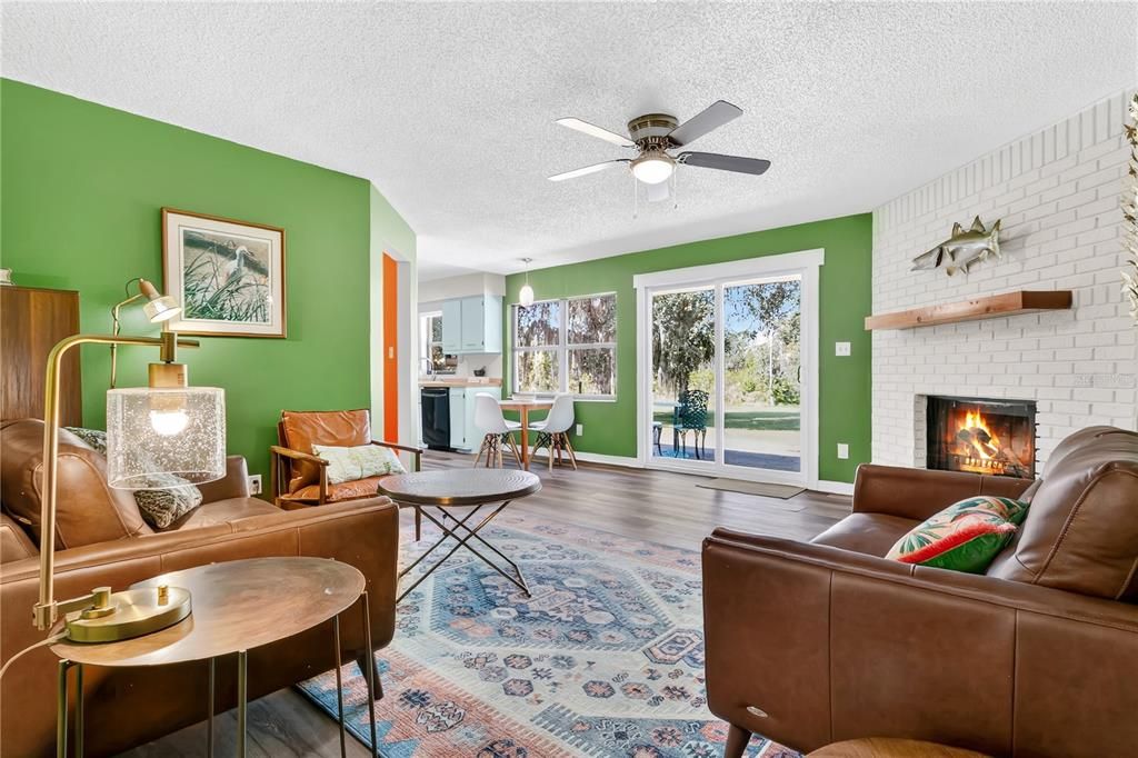 Dining room, Fireplace, Interior, Kitchen, Living room, Stone Walls, Wood Texture Flooring