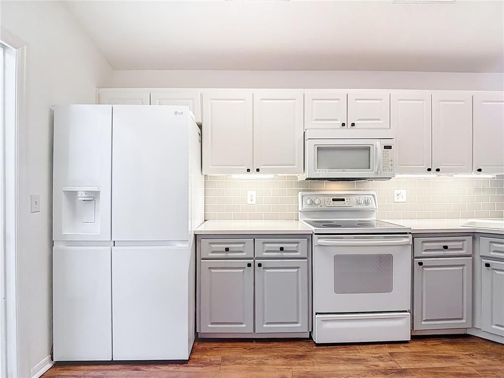 Interior, Kitchen, Tile Countertops, Wood Texture Flooring