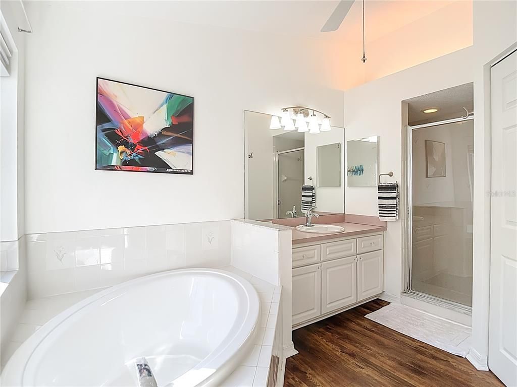 Bathroom, Dual Sink Vanities, Glass Shower, Interior, Wood Texture Flooring