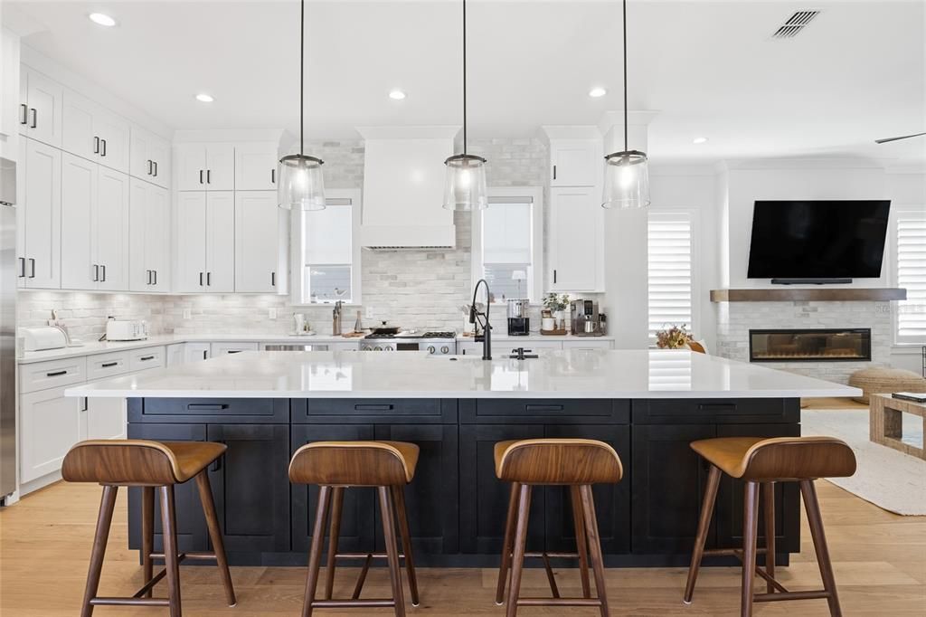 Fireplace, Interior, Kitchen, Pendant Lights, Recessed Lighting, Stainless Steel Appliances, Wood Texture Flooring