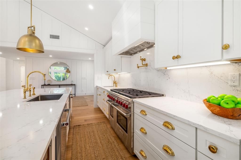 Interior, Kitchen, Marble Walls, Pendant Lights, Recessed Lighting, Stainless Steel Appliances, Wood Texture Flooring