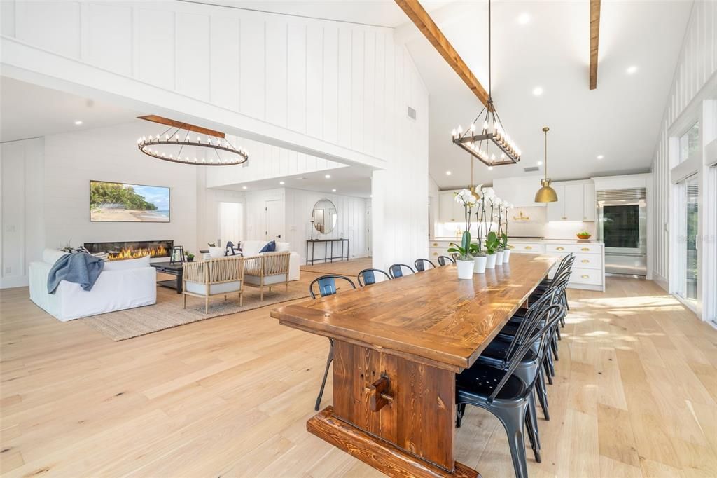 Chandelier, Dining room, Fireplace, Interior, Kitchen, Living room, Pendant Lights, Recessed Lighting, Wooden Beams, Wood Texture Flooring