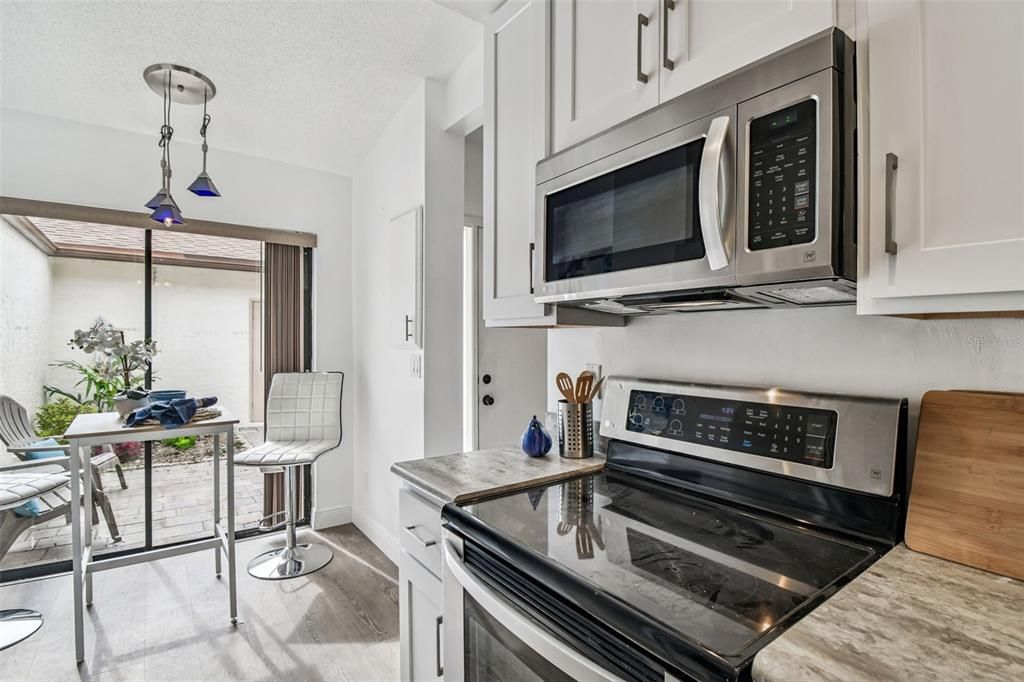 Interior, Kitchen, Pendant Lights, Stainless Steel Appliances, Wood Texture Flooring