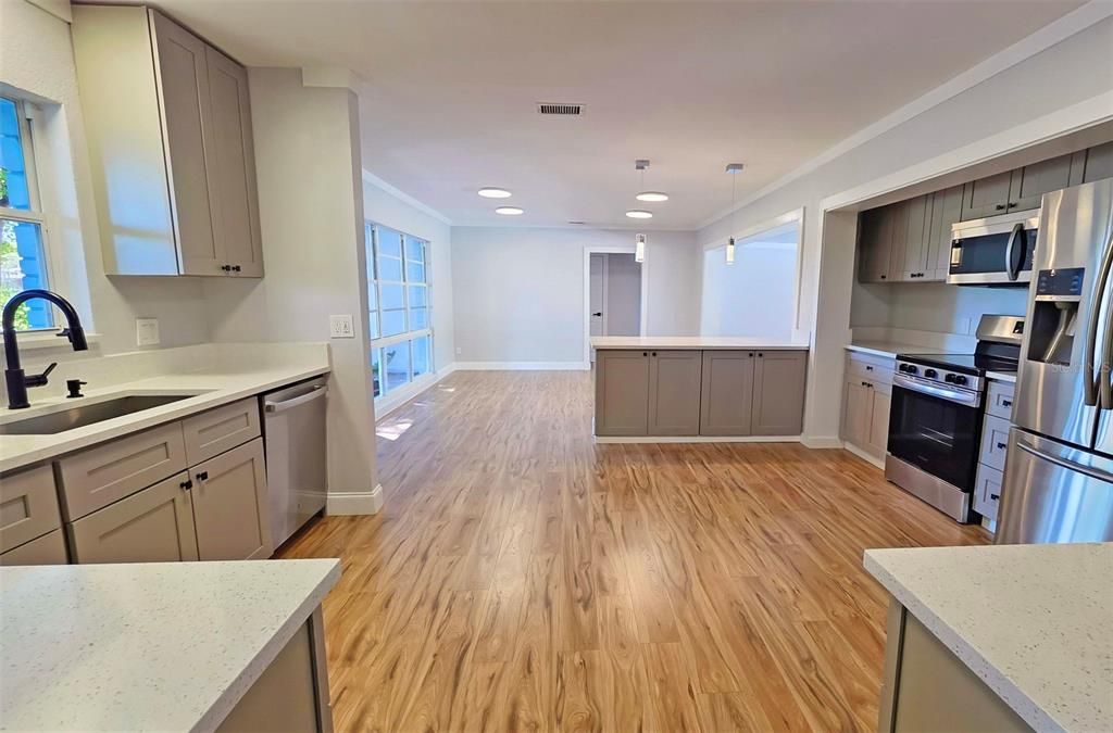 Interior, Kitchen, Pendant Lights, Recessed Lighting, Stainless Steel Appliances, Wood Texture Flooring