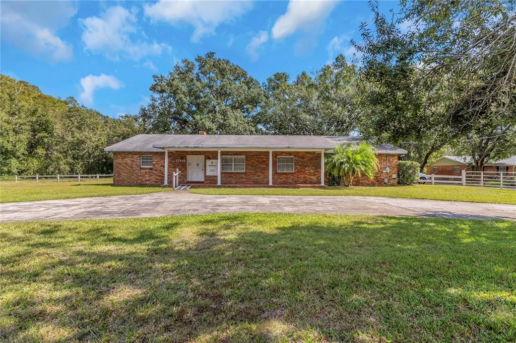 Attached, Backyard, Exterior, Facade, Brick Facade, Ranch