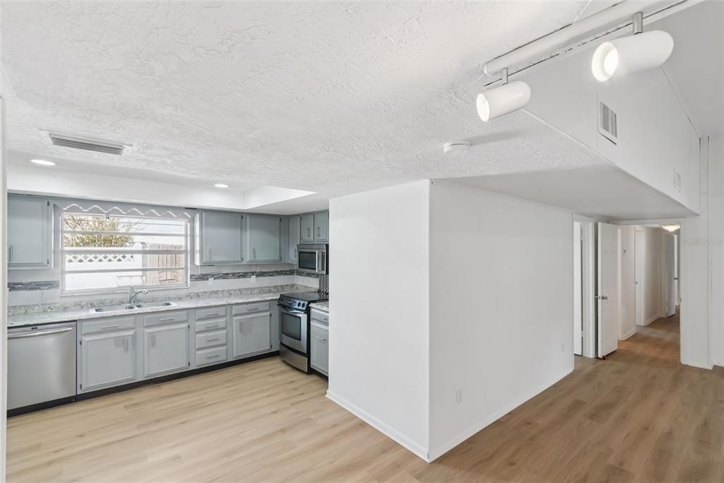 Interior, Kitchen, Recessed Lighting, Stainless Steel Appliances, Wood Texture Flooring