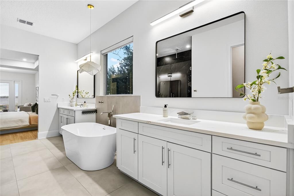 Bathroom, Bedroom, Dual Sink Vanities, Free Standing Baths, Interior, Pendant Lights, Recessed Lighting, Wood Texture Flooring