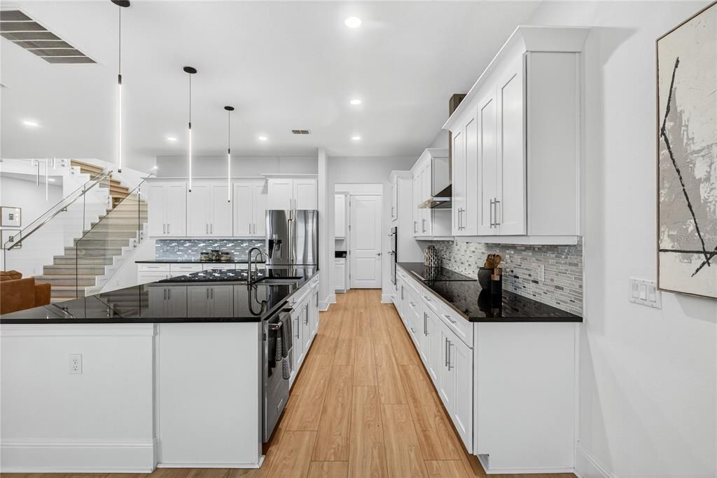 Interior, Kitchen, Pendant Lights, Recessed Lighting, Stainless Steel Appliances, Wood Texture Flooring