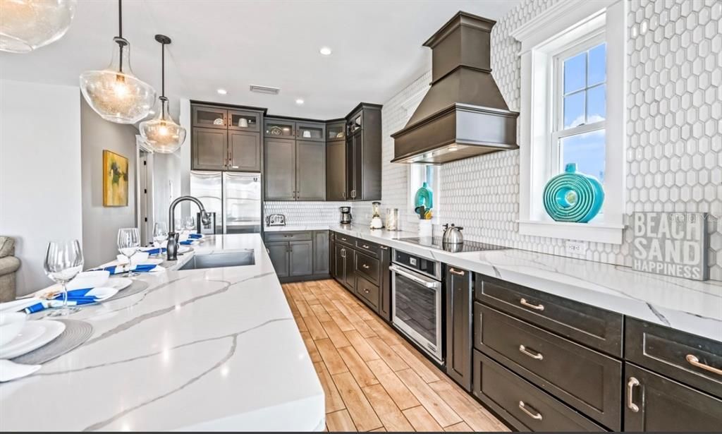 Interior, Kitchen, Pendant Lights, Recessed Lighting, Stainless Steel Appliances, Wood Texture Flooring