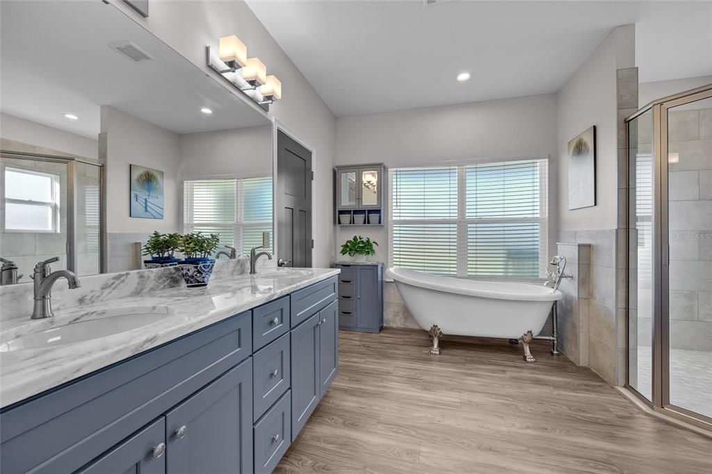 Bathroom, Dual Sink Vanities, Free Standing Baths, Glass Shower, Interior, Recessed Lighting, Wood Texture Flooring