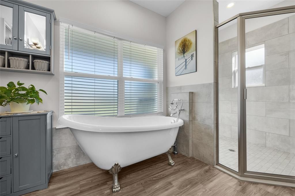 Bathroom, Free Standing Baths, Glass Shower, Interior, Recessed Lighting, Wood Texture Flooring