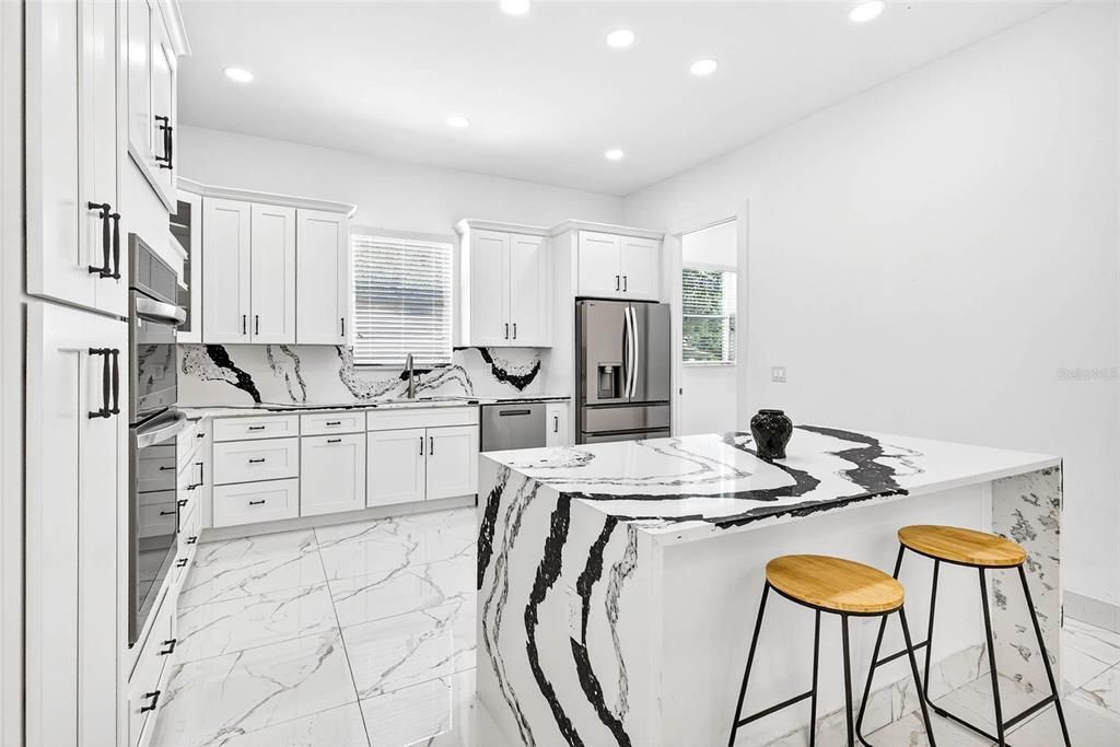 Interior, Kitchen, Marble, Marble Walls, Recessed Lighting, Stainless Steel Appliances