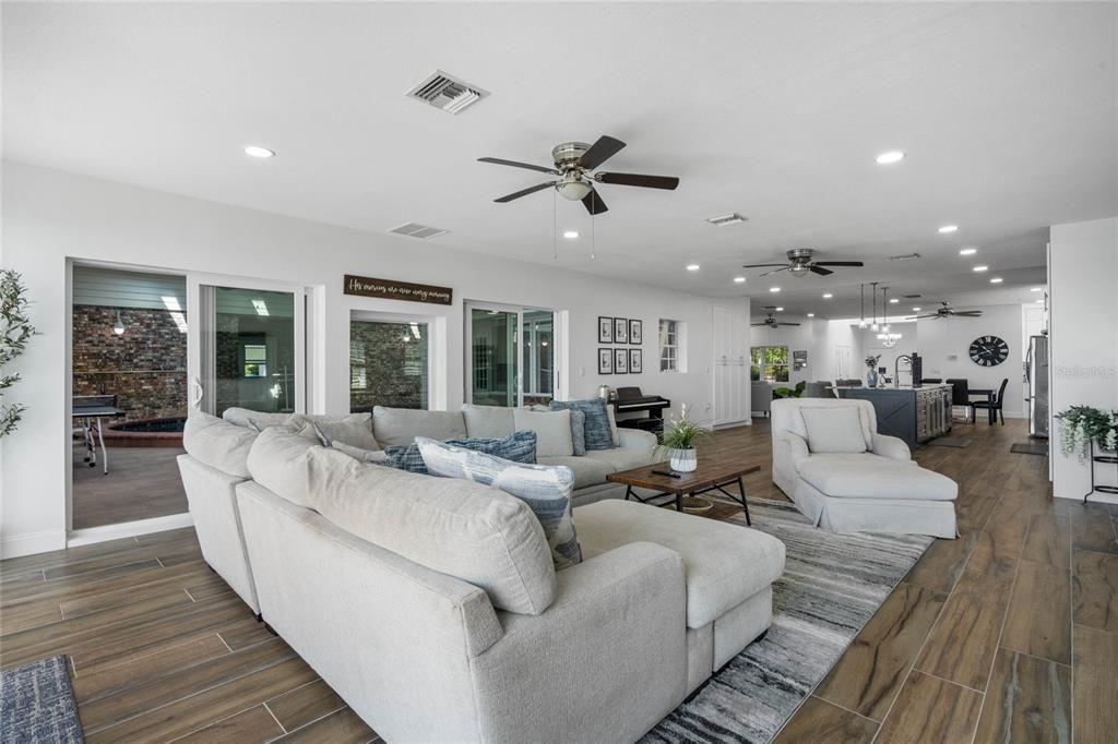 Dining room, Interior, Living room, Pendant Lights, Recessed Lighting, Wood Texture Flooring