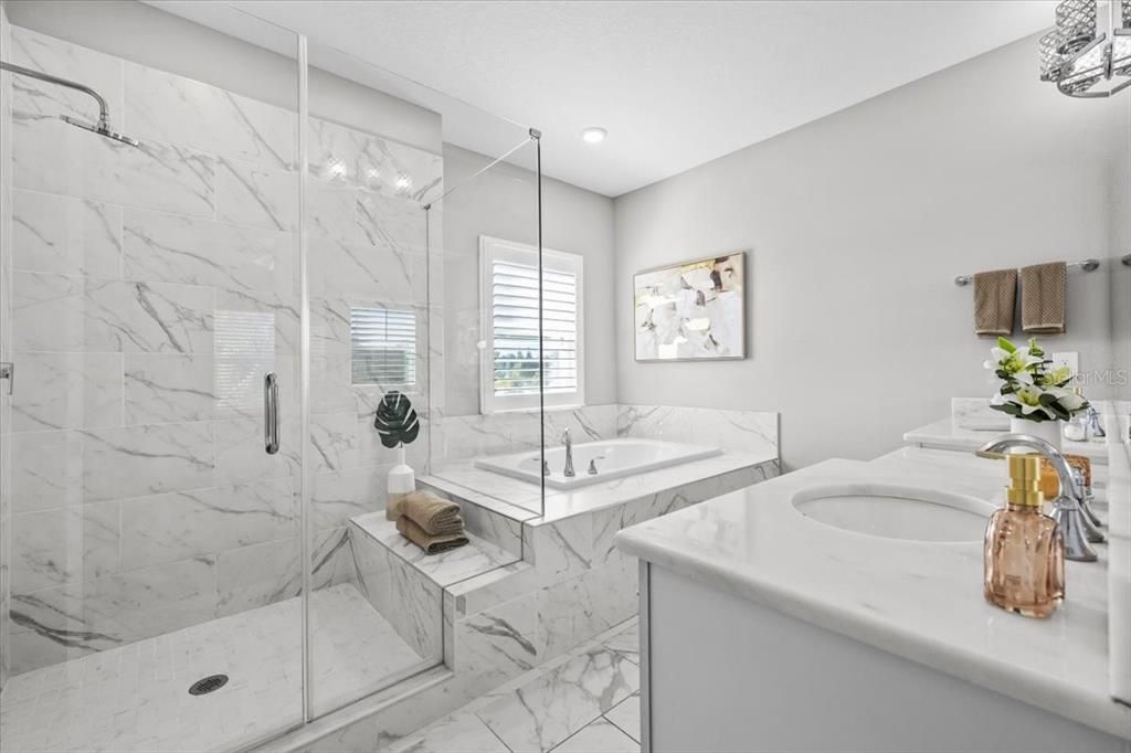 Bathroom, Dual Sink Vanities, Glass Shower, Interior, Marble, Marble Walls, Recessed Lighting