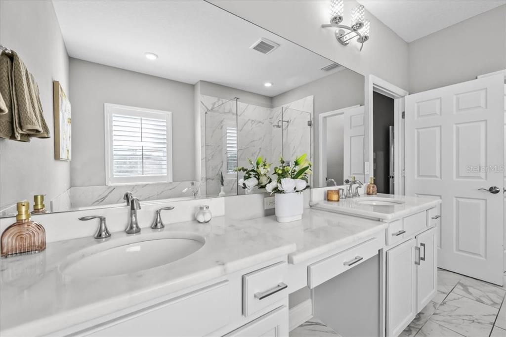 Bathroom, Dual Sink Vanities, Interior, Marble, Marble Walls, Recessed Lighting