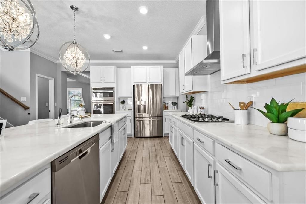 Interior, Kitchen, Pendant Lights, Recessed Lighting, Stainless Steel Appliances, Wood Texture Flooring
