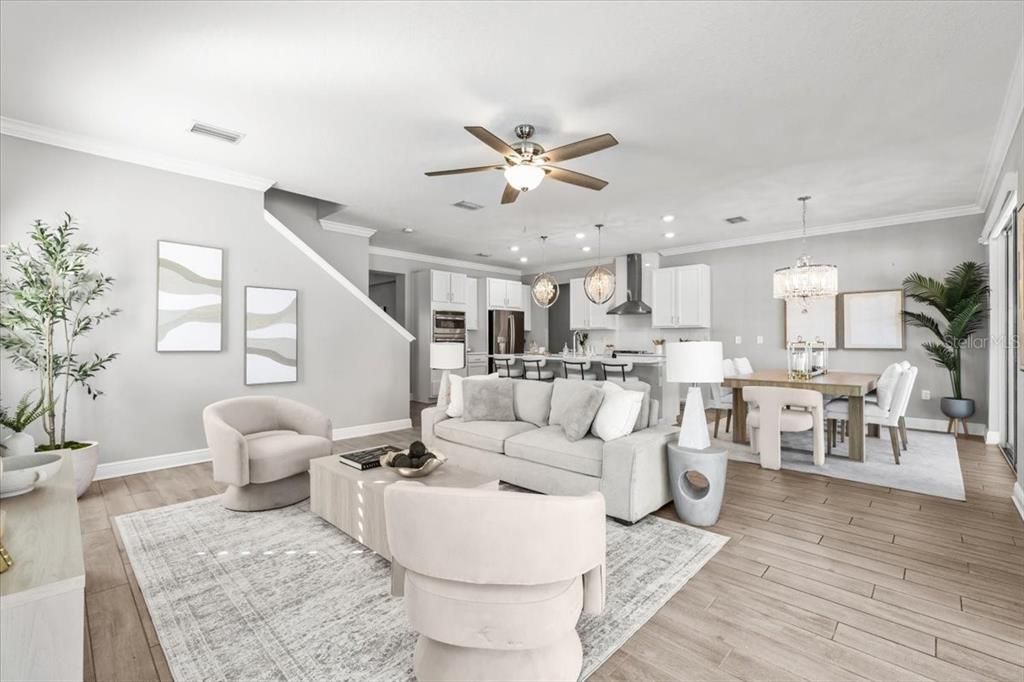 Chandelier, Dining room, Interior, Kitchen, Living room, Pendant Lights, Recessed Lighting, Stainless Steel Appliances, Wood Texture Flooring