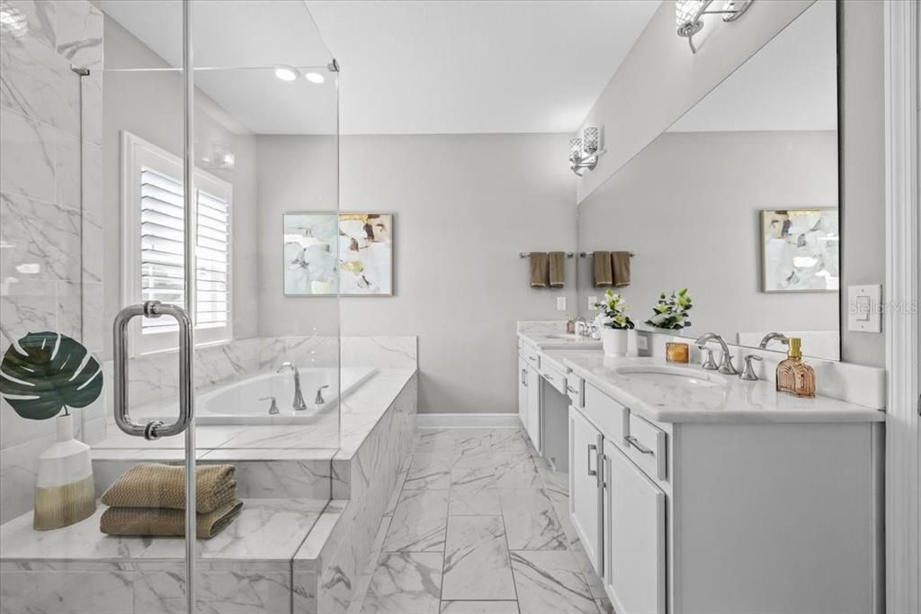 Bathroom, Dual Sink Vanities, Glass Shower, Interior, Marble, Marble Walls, Recessed Lighting