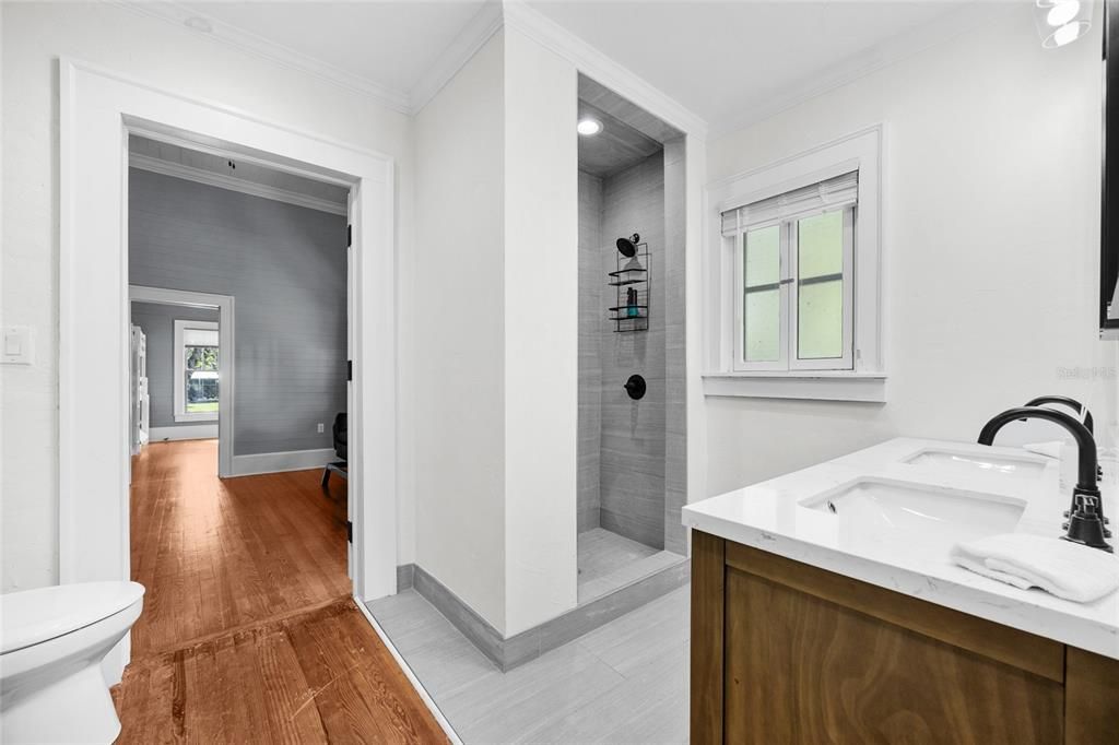 Bathroom, Dual Sink Vanities, Interior, Recessed Lighting, Wood Texture Flooring