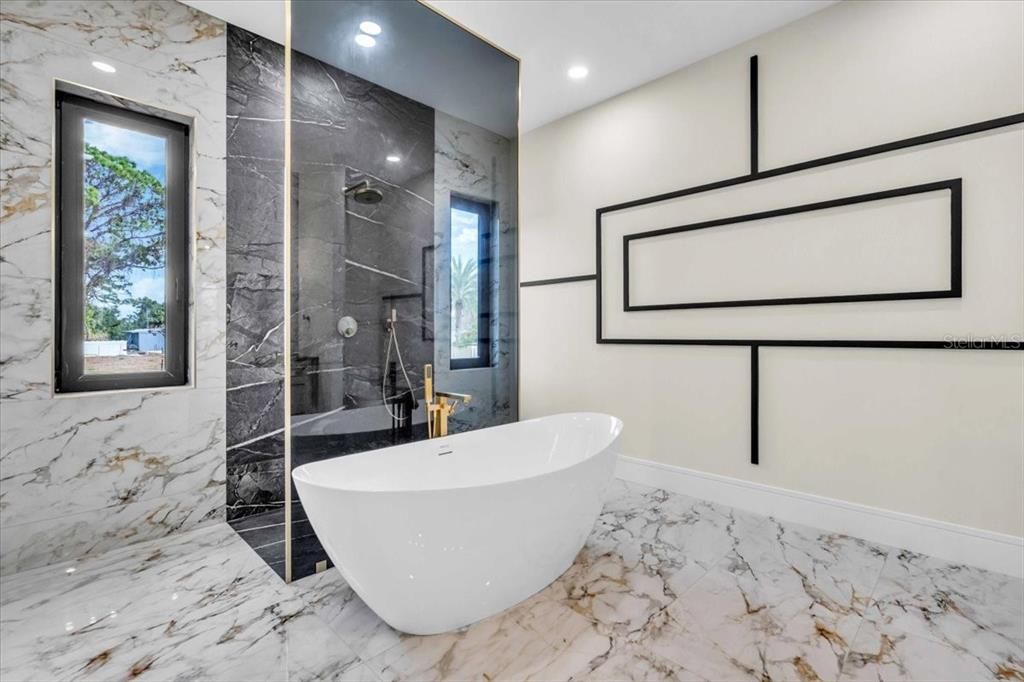 Bathroom, Free Standing Baths, Glass Shower, Interior, Marble, Marble Walls, Recessed Lighting
