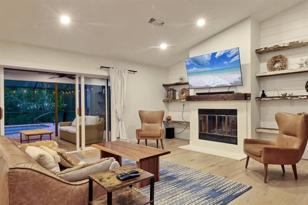 Fireplace, Interior, Living room, Recessed Lighting, Wood Texture Flooring