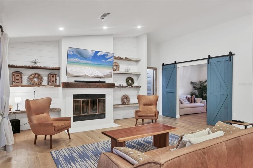 Fireplace, Interior, Living room, Recessed Lighting, Wood Texture Flooring