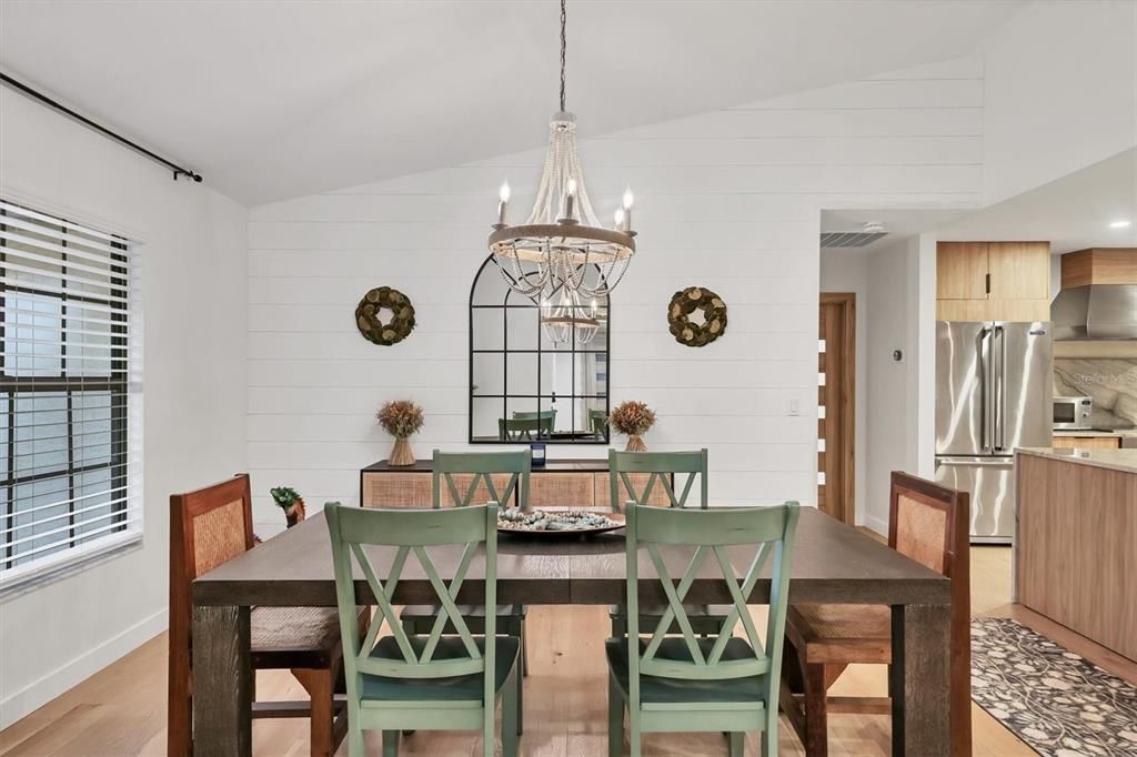 Chandelier, Dining room, Interior, Kitchen, Recessed Lighting, Stainless Steel Appliances, Wood Texture Flooring