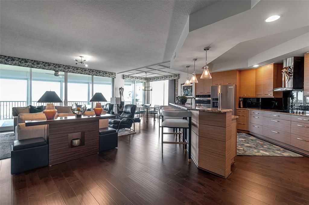 Dining room, Interior, Kitchen, Living room, Pendant Lights, Recessed Lighting, Stainless Steel Appliances, Wood Texture Flooring