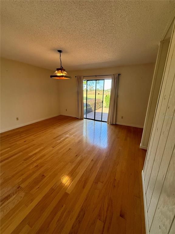 Empty room, Interior, Pendant Lights, Wood Texture Flooring