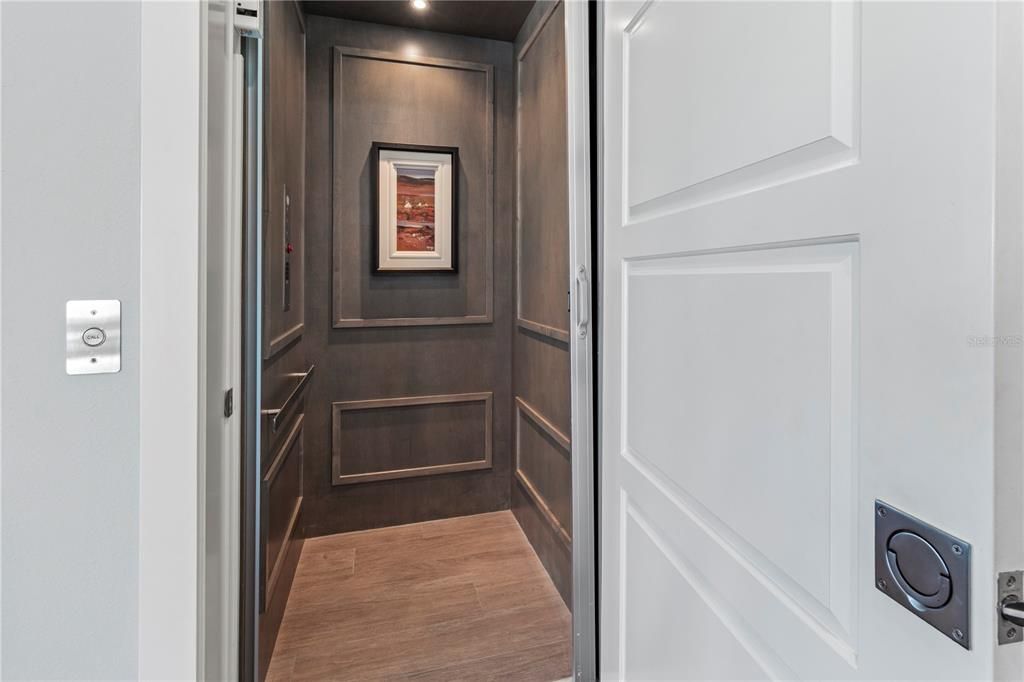 Elevator, Interior, Recessed Lighting, Wood Texture Flooring, Wooden Walls