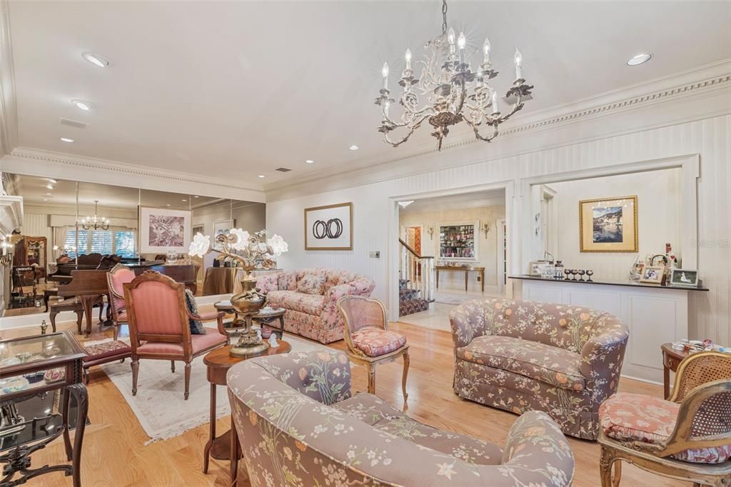 Chandelier, Dining room, Interior, Living room, Piano, Recessed Lighting, Wood Texture Flooring