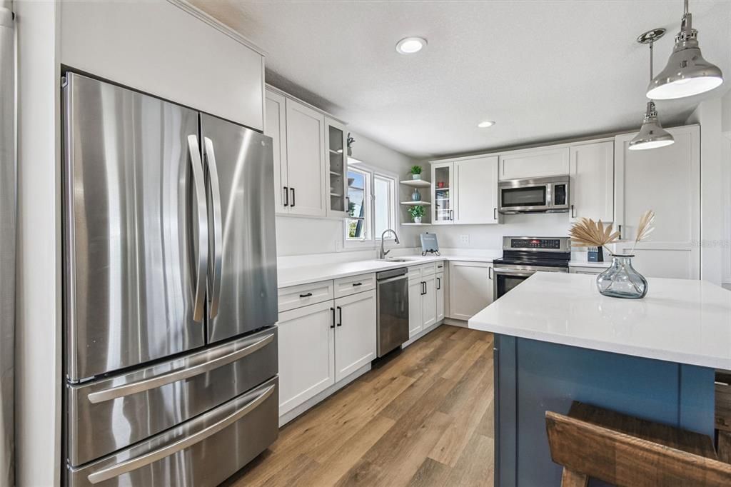 Interior, Kitchen, Pendant Lights, Recessed Lighting, Stainless Steel Appliances, Wood Texture Flooring