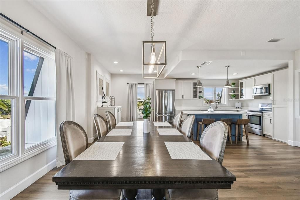 Dining room, Interior, Kitchen, Pendant Lights, Recessed Lighting, Stainless Steel Appliances, Wood Texture Flooring