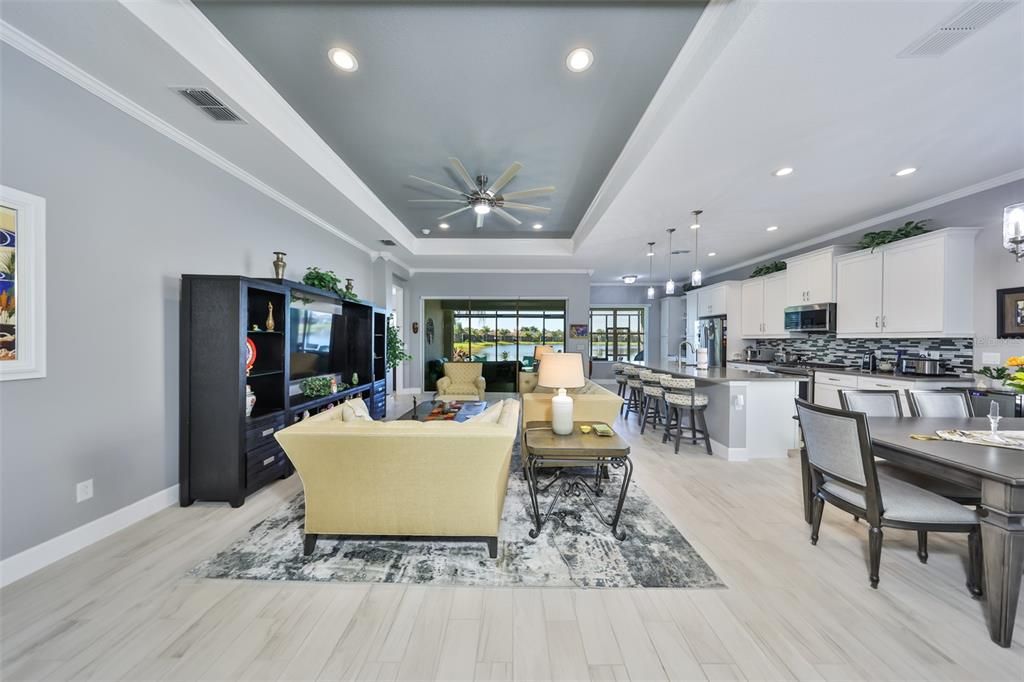 Dining room, Interior, Kitchen, Living room, Pendant Lights, Recessed Lighting, Stainless Steel Appliances, Wood Texture Flooring