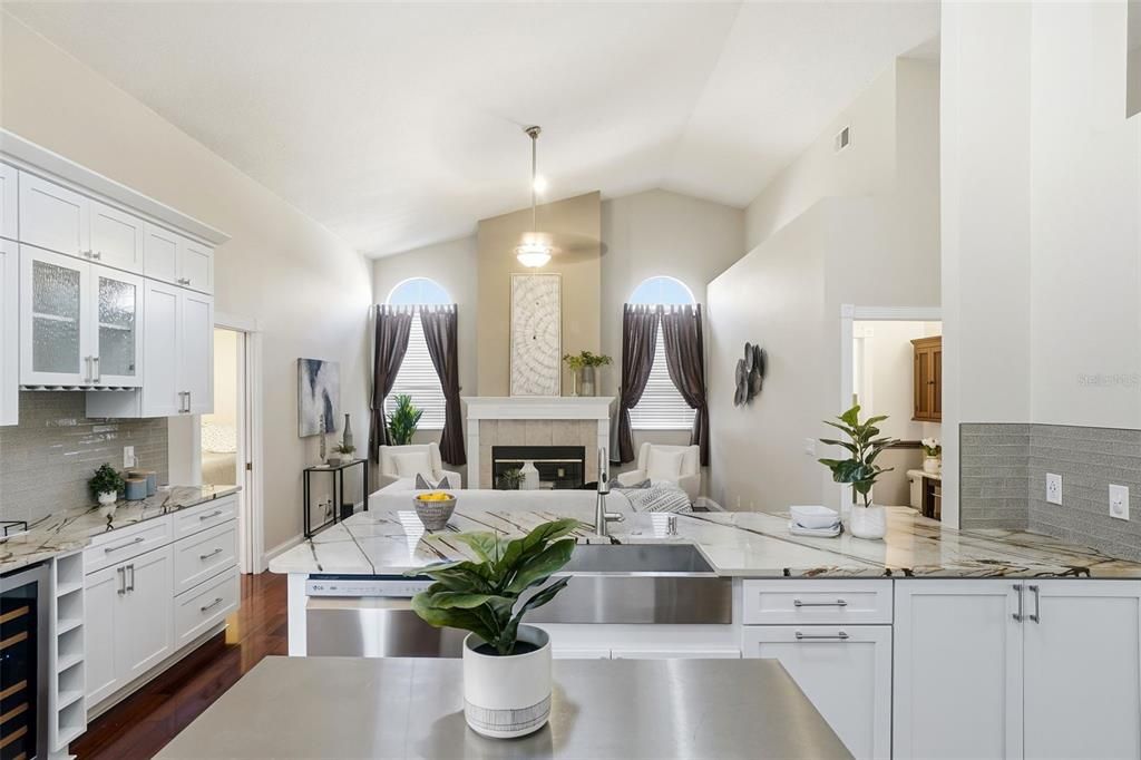 Fireplace, Interior, Kitchen, Pendant Lights, Stainless Steel Appliances, Wood Texture Flooring