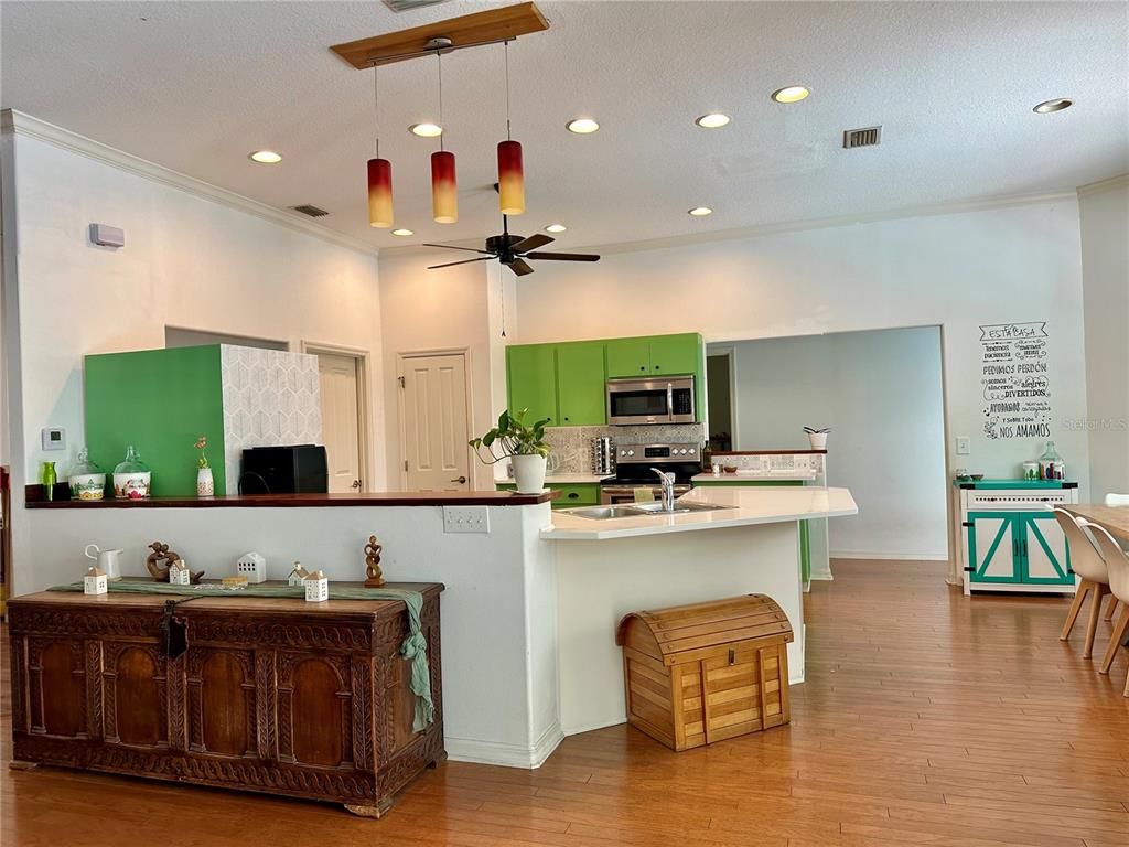 Interior, Kitchen, Pendant Lights, Recessed Lighting, Stainless Steel Appliances, Wood Texture Flooring