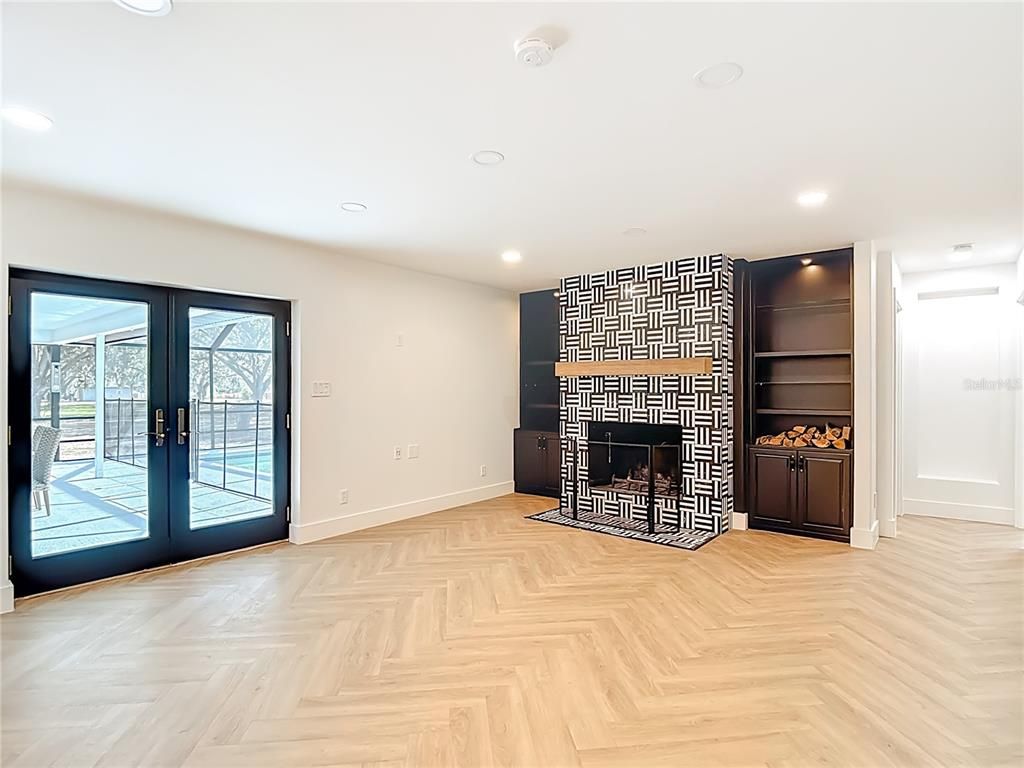 Empty room, Fireplace, Interior, Recessed Lighting, Wood Texture Flooring