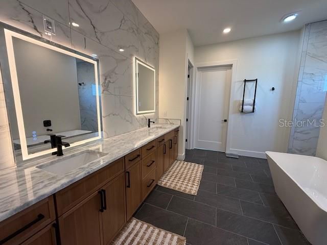 Bathroom, Dual Sink Vanities, Free Standing Baths, Interior, Marble Walls, Recessed Lighting