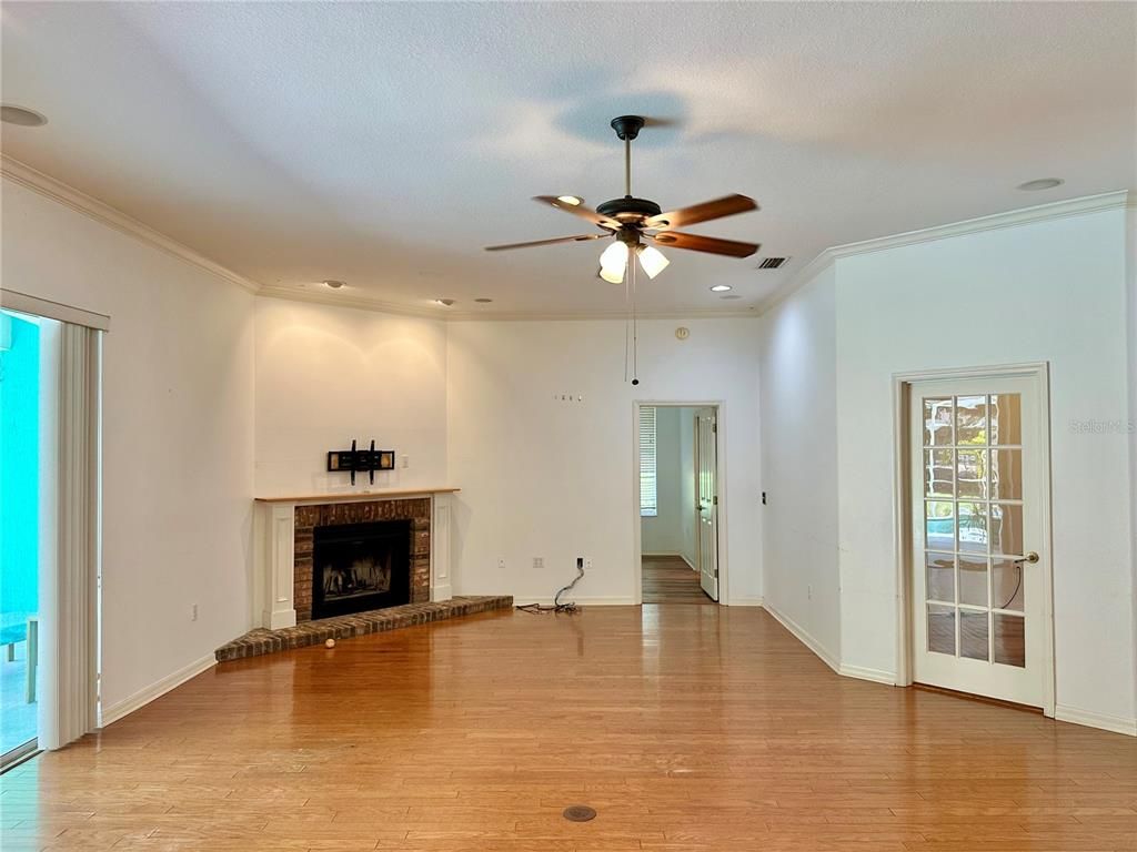 Empty room, Fireplace, Interior, Recessed Lighting, Wood Texture Flooring