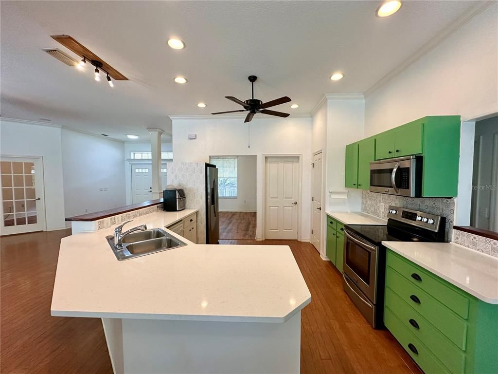 Interior, Kitchen, Recessed Lighting, Stainless Steel Appliances, Wood Texture Flooring