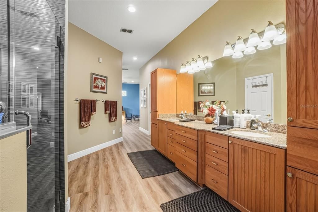 Bathroom, Dual Sink Vanities, Interior, Recessed Lighting, Wood Texture Flooring