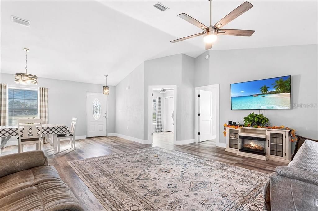 Dining room, Fireplace, Interior, Pendant Lights, Wood Texture Flooring