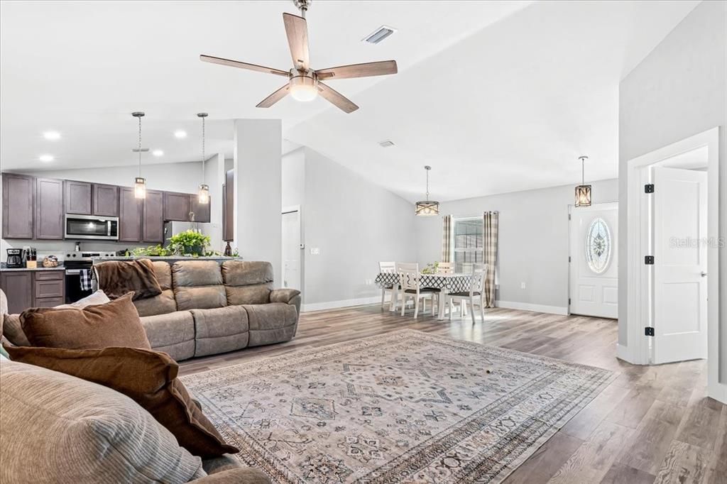 Dining room, Interior, Kitchen, Living room, Pendant Lights, Recessed Lighting, Stainless Steel Appliances, Wood Texture Flooring