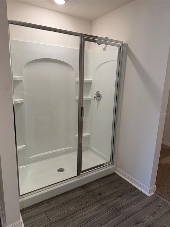 Bathroom, Glass Shower, Interior, Recessed Lighting, Wood Texture Flooring