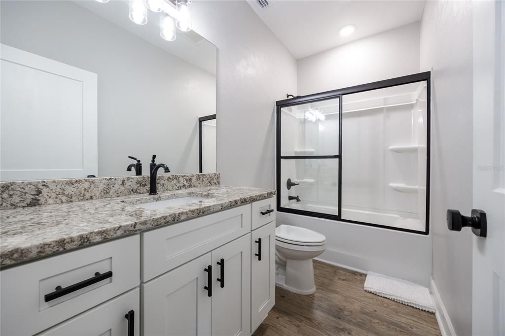 Bathroom, Glass Shower, Interior, Recessed Lighting, Wood Texture Flooring