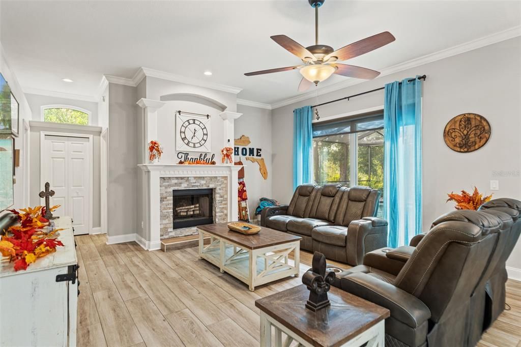 Fireplace, Interior, Living room, Recessed Lighting, Wood Texture Flooring