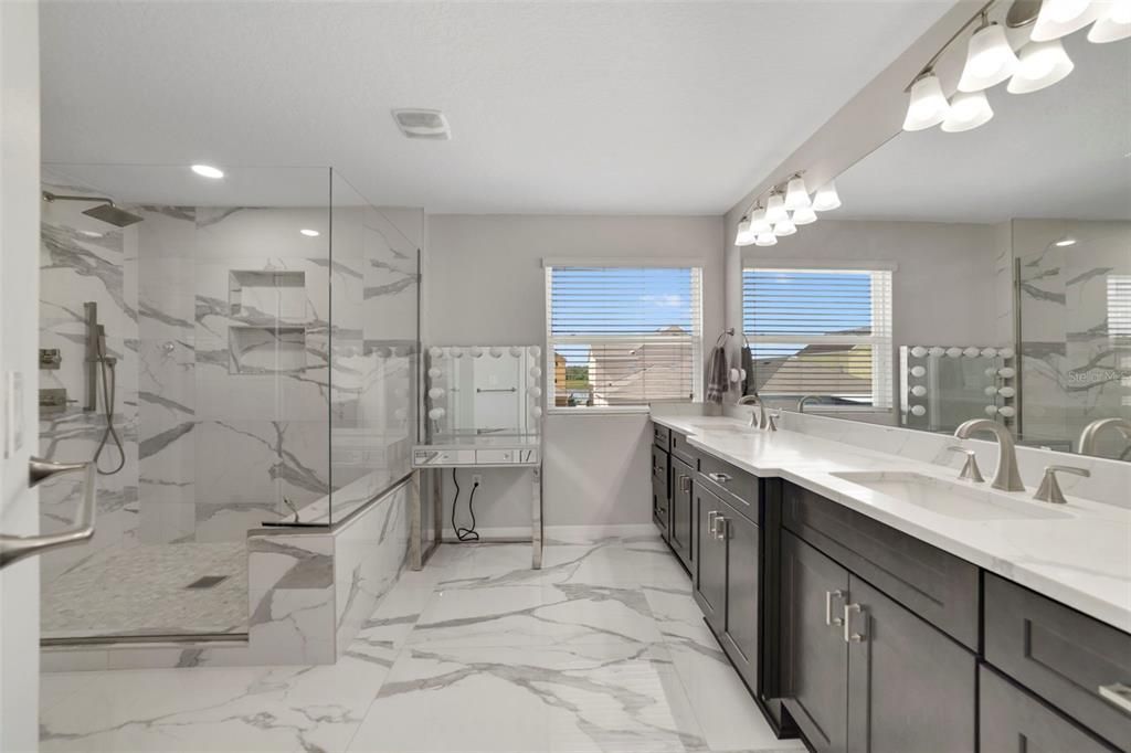 Bathroom, Dual Sink Vanities, Glass Shower, Interior, Marble, Marble Walls, Recessed Lighting