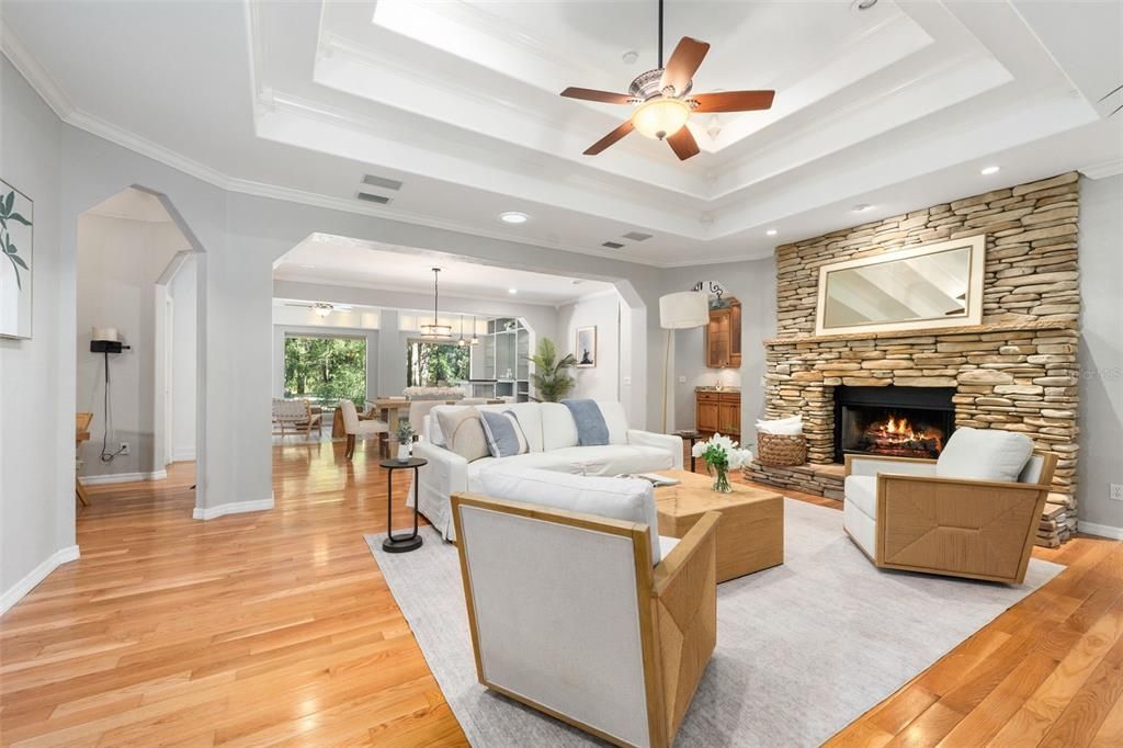 Dining room, Fireplace, Interior, Living room, Pendant Lights, Recessed Lighting, Stone Walls, Wood Texture Flooring