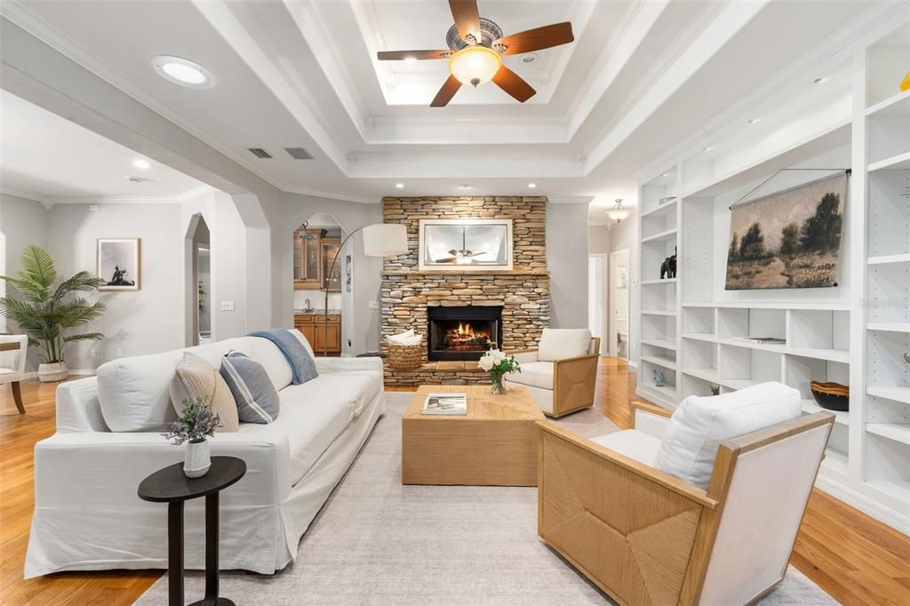 Fireplace, Interior, Living room, Recessed Lighting, Stone Walls, Wood Texture Flooring